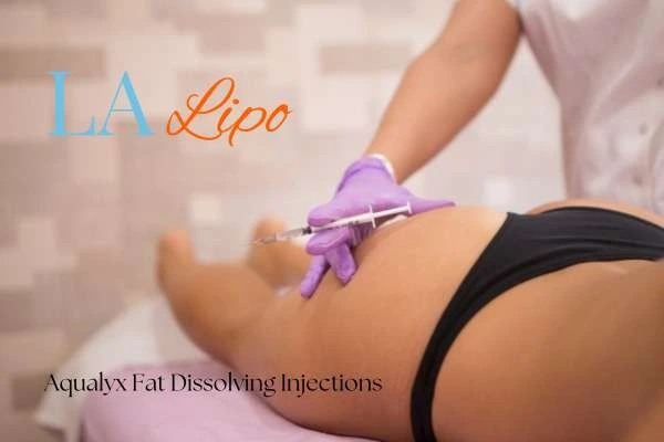 Woman having fat dissolving injections Harlow on thighs