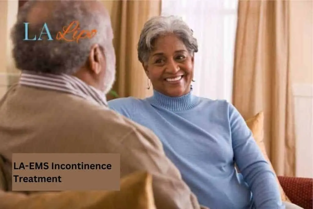 Couple sat smiling at each other - LA-EMS treatment Harlow